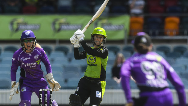 Heavy hitter: Rachael Haynes goes over the top against the Hobart Hurricanes at Manuka Oval.