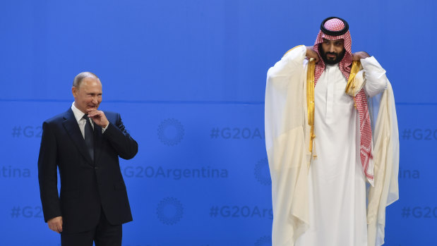 Russian President Vladimir Putin  and Saudi Crown Prince Mohammad bin Salman. Both countries face a painful transition away from fossil fuel dependency.