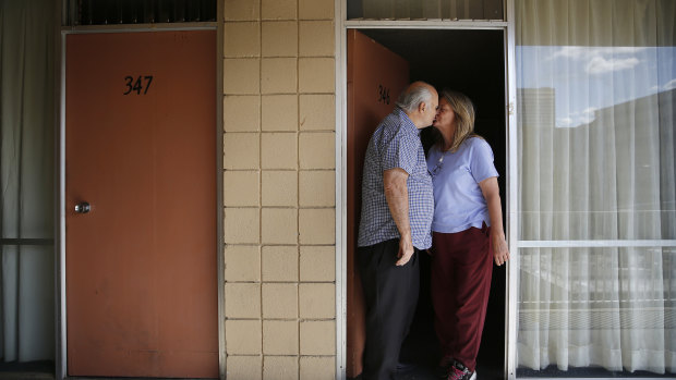 Dave Frazier and Dawn Robinson outside their Fireside Inn motel unit in downtown Reno. 