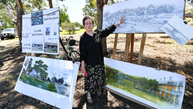 Kate Auty beside an artist’s impression of how the bridge might look. 