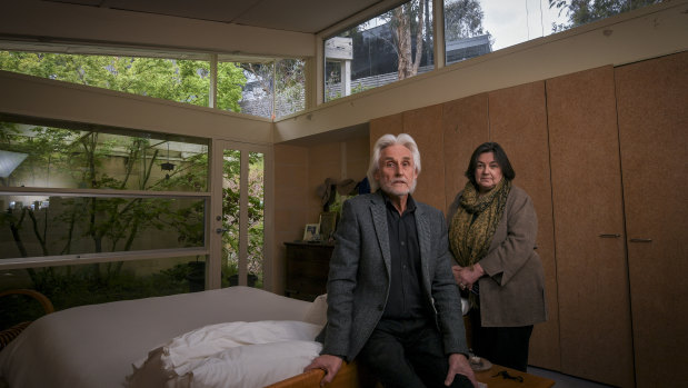 Jan and Gary Hancock in their Eltham home, with the neighbouring property overlooking them.