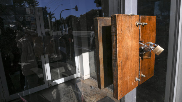 Padlocks on the door of the Bay Hotel in Mordialloc.