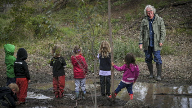 Bush kinder educator Doug Fargher with children at the Darebin Parklands.