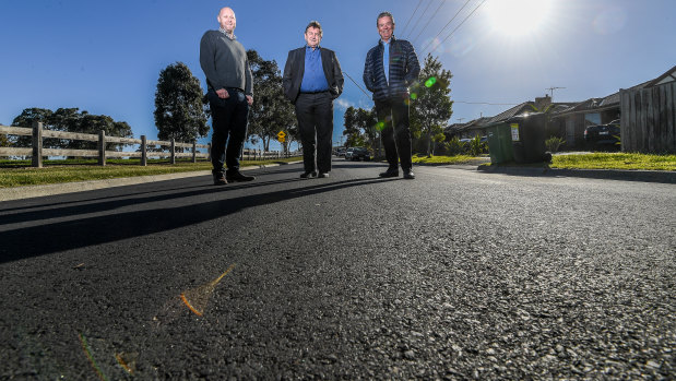 Jim Appleby of Downer, Hume mayor Geoff Porter and Peter Tamblyn of Close the Loop on Rayfield Avenue.