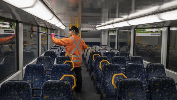 Sydney trains cleaner on a Tangara Train at Mortdale Depot.