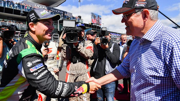 Prime Minister Scott Morrison, pictured here yesterday at the Bathurst 1000, will headline a major fundraiser in Sydney tomorrow to aid Dave Sharma's Wentworth campaign.