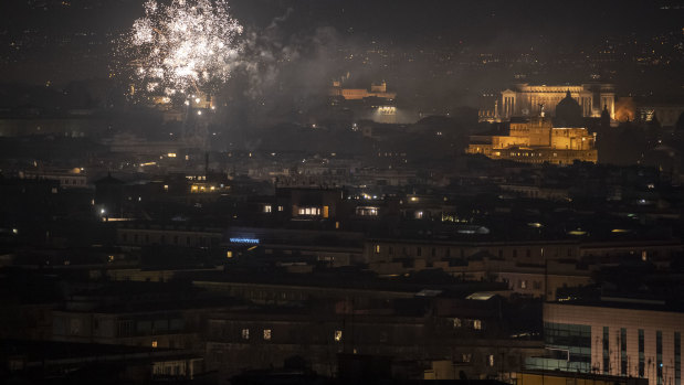 Fireworks are seen over the city of Rome while people celebrate New Year's Eve during the Coronavirus pandemic.