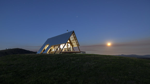 The hut is like a beacon as the sun rises.