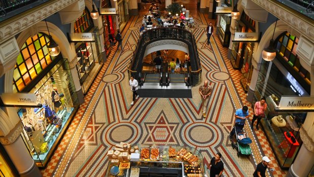 The interior of the Romanesque Revival QVB building.