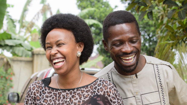 Uganda's leading opposition challenger Bobi Wine, right, and his wife Barbie Kyagulanyi, in cheerful mood after casting their votes in Kampala.