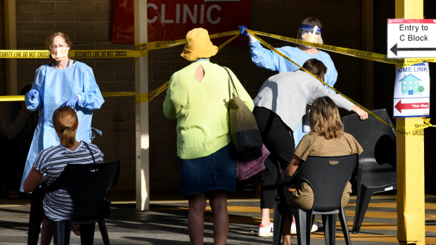 Lining up for a "fever clinic" at Sir Charles Gairdner hospital in Perth.