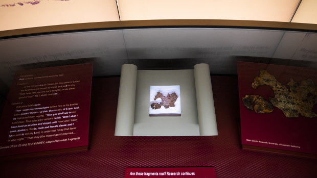 A small fragment of what the Museum of the Bible questioned was part of the Dead Sea Scrolls (bottom) turned out to be fake. 