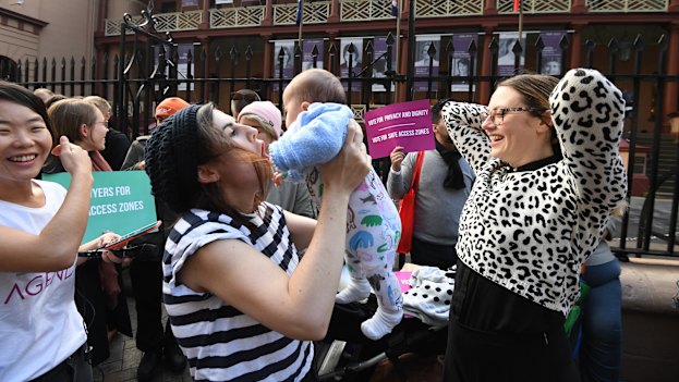 Supporters of safe zones outside abortion clinics celebrate NSW laws in 2018 that prevent women being harassed. 