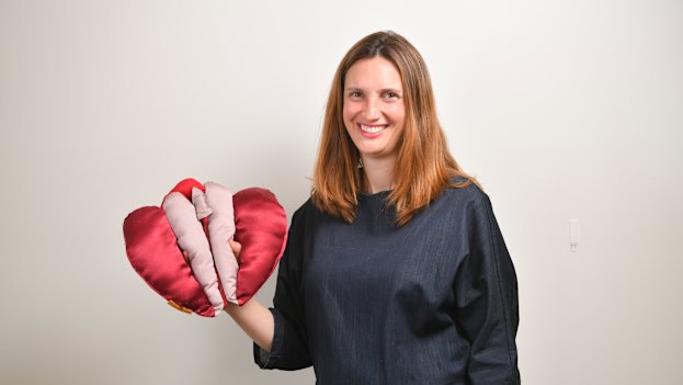 Occupational therapist Anita Brown-Major and her satin vulva puppet, which she uses in teaching.