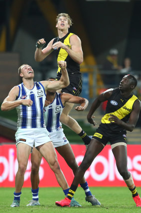 Tom Lynch attempts a mark during round seven against the Roos. 