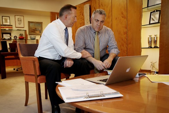Former prime minister Tony Abbott and treasurer Joe Hockey prepare for the 2015 budget after their ill-fated first outing in 2014.