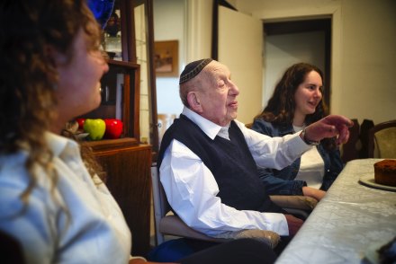 Full of life: Berysz Aurbach flanked by granddaughters Tali (left) and Dani Jackson at his 104th birthday party.