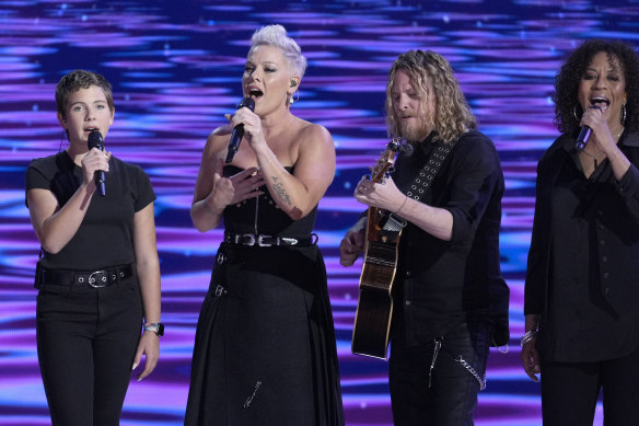 Pink and her daughter Willow, left, perform on the last day of a star-studded Democratic National Convention.