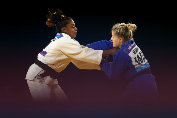 Sri Lanka’s Chamila Dilani Marappulige – seen here in white competing against Ashleigh-Anne Barnikel of Wales during the women’s judo – is believed to have gone missing. 