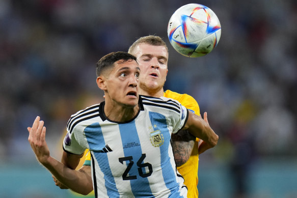 Nahuel Molina battles for possession with Australia’s Riley McGree.