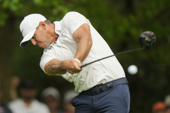 Brooks Koepka hits his tee shot on the seventh hole during the second round.