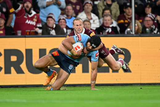 Daly Cherry-Evans runs down Stephen Crichton in Origin II.