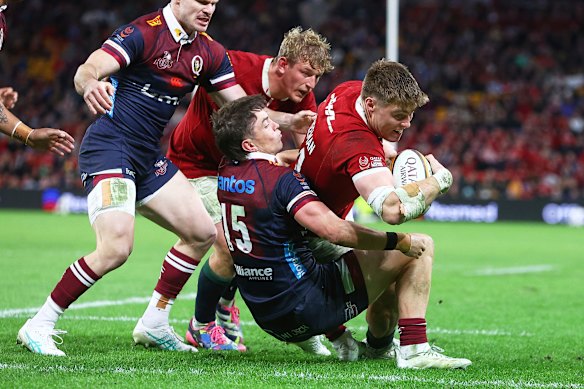 Tommy Freeman of the British & Irish Lions scores a try