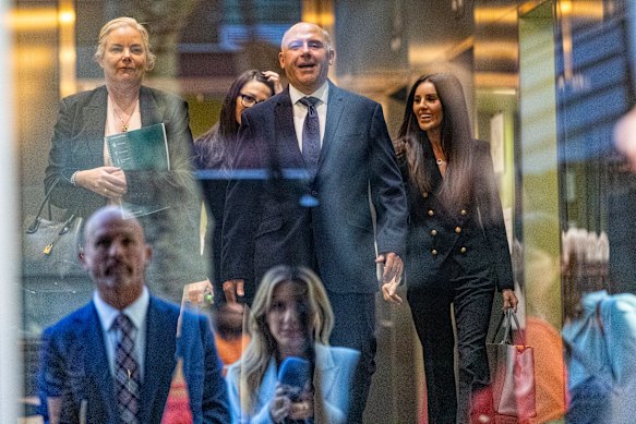 Tony Mokbel (centre) walks free from the Supreme Court as the media (bottom left) watch on.