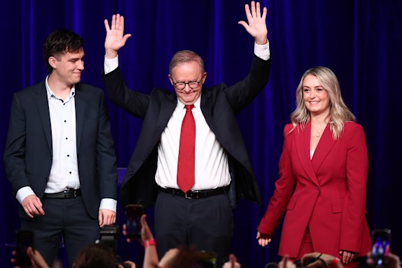 Prime Minister Anthony Albanese alongside his fiancee Jodie Haydon and son Nathan claims victory.