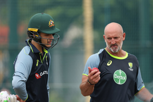 Sam Konstas speaks with batting coach Michael Di Venuto during an Australia nets session at Galle.