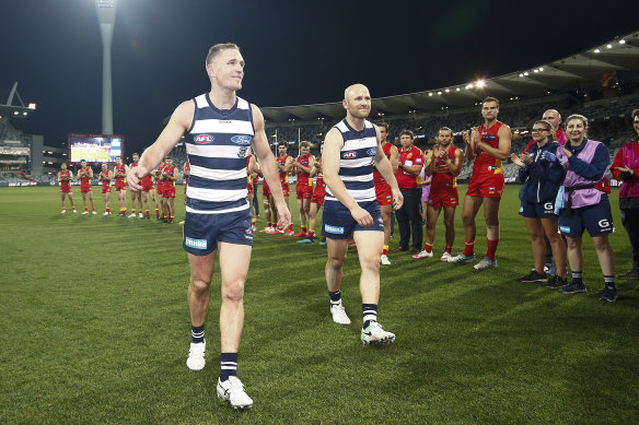 Joel Selwood, left, and Gary Ablett, right, marked milestones against the Suns. 