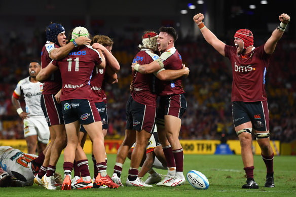 Queensland Reds celebrate victory.