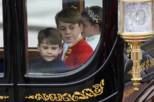 Prince Louis, Prince George and Princess Charlotte (from left) return to Buckingham Palace.