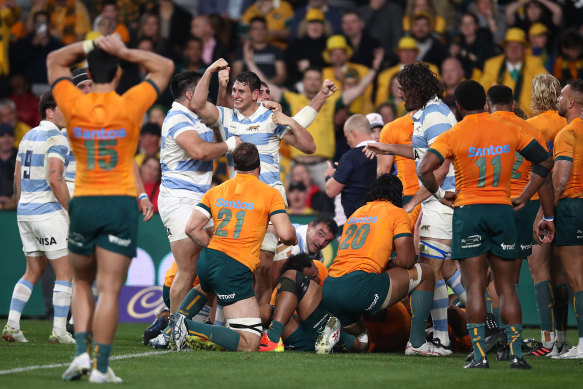 The Pumas celebrate after Juan Martin Gonzalez scores the winning try.