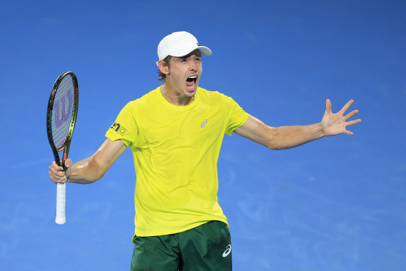 Alex de Minaur celebrates victory over Matteo Berrettini.