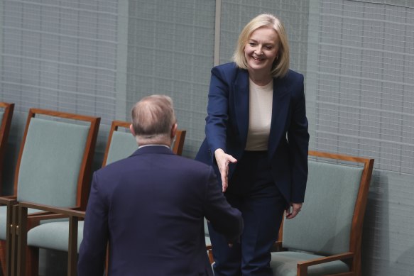 Prime Minister Anthony Albanese greets former UK prime minister Liz Truss.