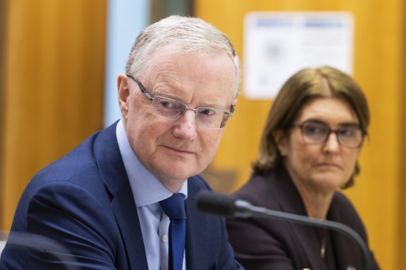 Outgoing RBA governor Philip Lowe and his successor, deputy governor Michele Bullock.
