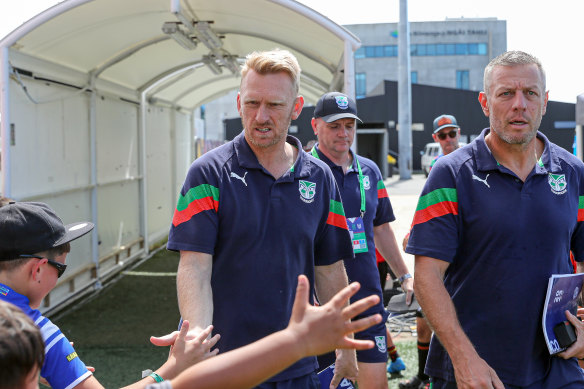 Warriors coach Andrew Webster greets fans during the pre-season.