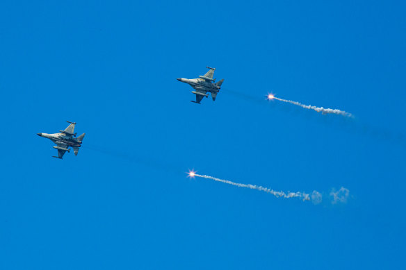 Taiwan’s Indigenous Defence Fighter jets release flares during the Han Kuang military exercise Pingtung, Taiwan. The drill simulates the Chinese People’s Liberation Army (PLA) invading the island