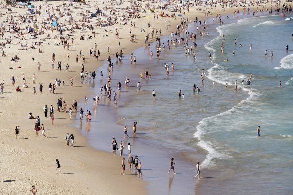 A man has been charged with taking intimate photos of women at Bronte and Bondi Beach.