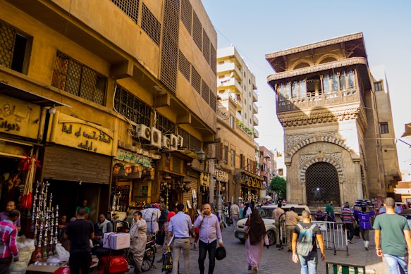 Bustling, historic Al-Muizz Street in Cairo, Egypt.