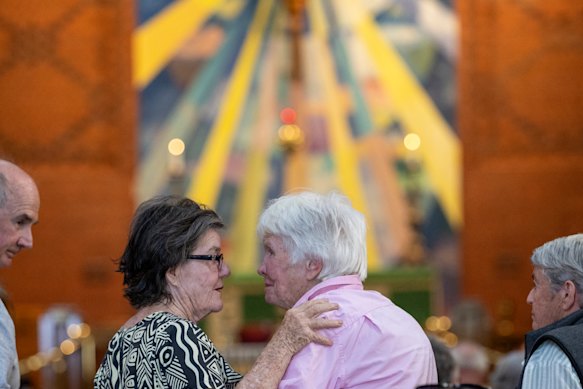 Former independent Indi MP Cathy McGowan, left, and a Haines supporter at a service in Wangaratta.
