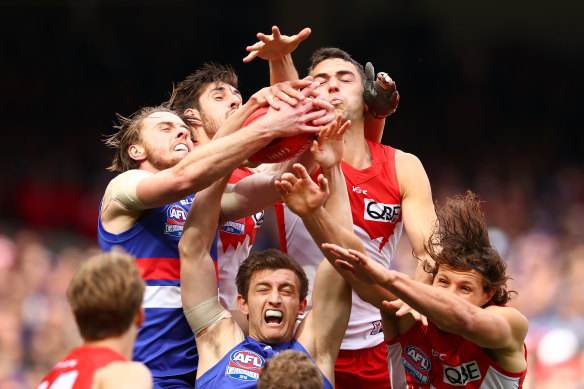 Players contest a mark during the 2016 grand final.