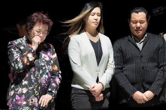 Selina, Zilvia, and Alpha Cheng at a ceremony at NSW Police Force headquarters to remember fallen colleague Curtis Cheng on the 10th anniversary of his death.