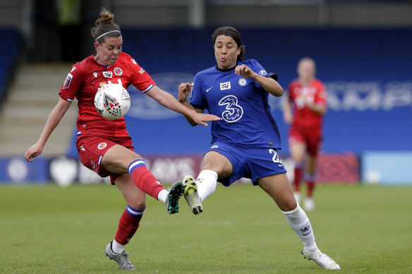 Reading’s Deanna Cooper and Chelsea’s Sam Kerr fight for possession of during their Barclays FA Women’s Super League clash at Kingsmeadow on Sunday.