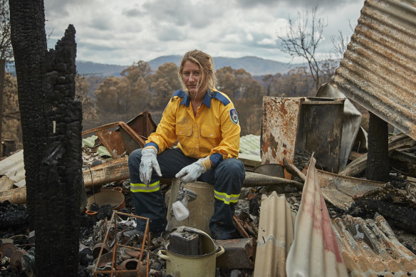 Anika Craney in the burnt-out remains of her home.