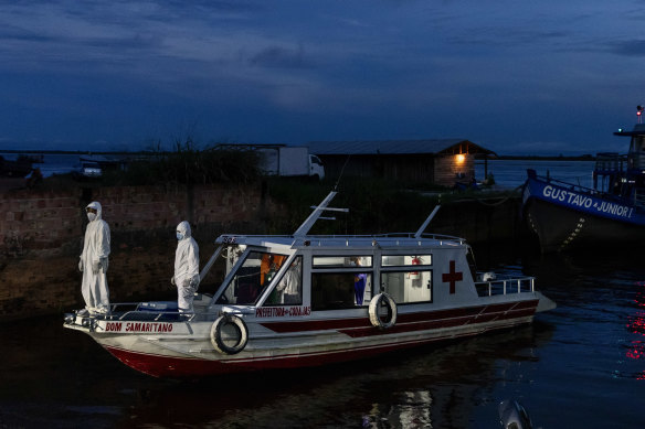 A floating ambulance bearing coronavirus patients arrives in Manacapuru, Amazonas state, Brazil.