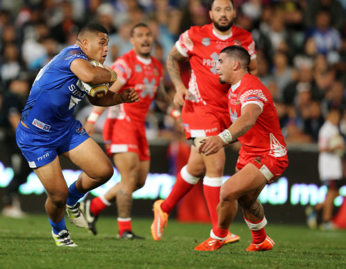 John Asiata playing for Samoa in 2016, against the Tongan side he would represent three years later.