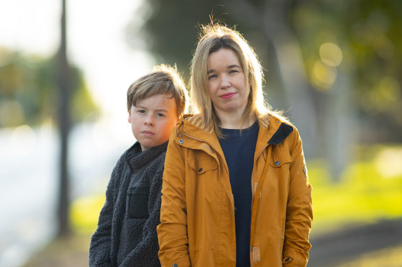 Becky McDonagh and her son Harry. Harry attends St Joseph’s, one of four Catholic schools that might close.