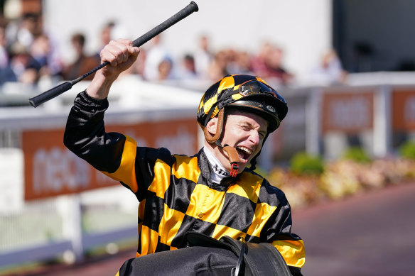 Overjoyed: James McDonald returns to the mounting yard after winning the Thousand Guineas aboard Joliestar.